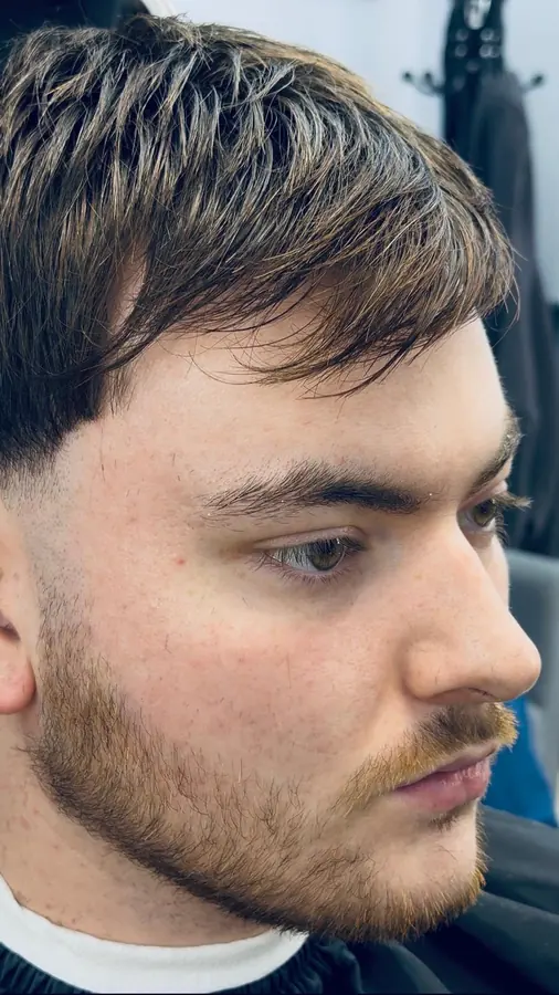 Close-up of fringe cut with clean taper